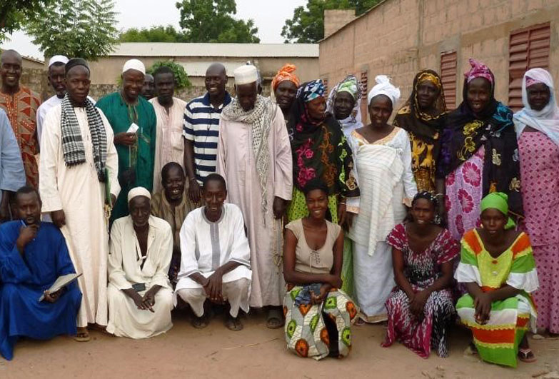 Group photo of men and women, community leaders in Senegal