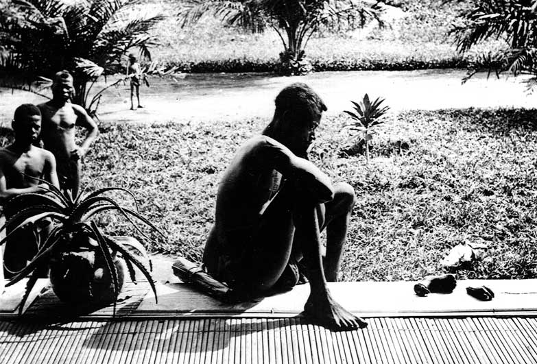 Man with the hand and foot of his five year old daughter. Alice Seeley Harris, who documented Belgian Congo abuses for Anti-Slavery Society.