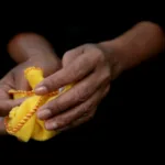 A domestic worker cleans