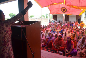 Women in community meeting