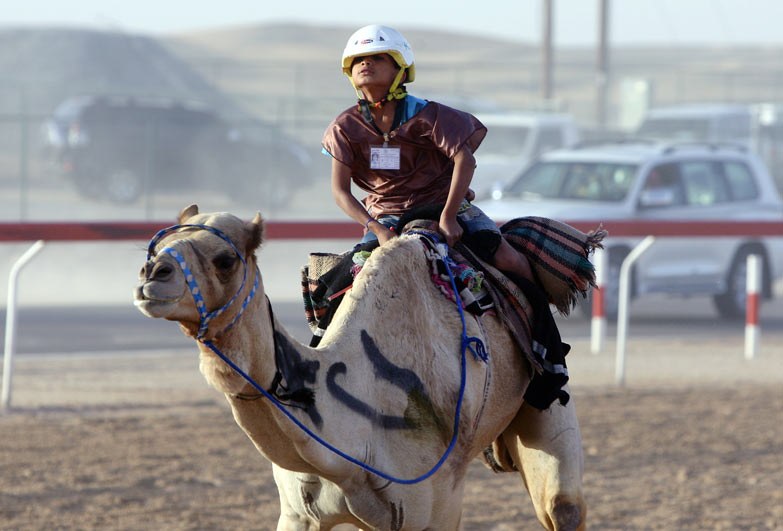 Child camel jockey in the United Arab Emirates.