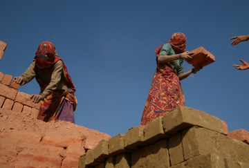 a family in debt bondage work at a brick kiln in India