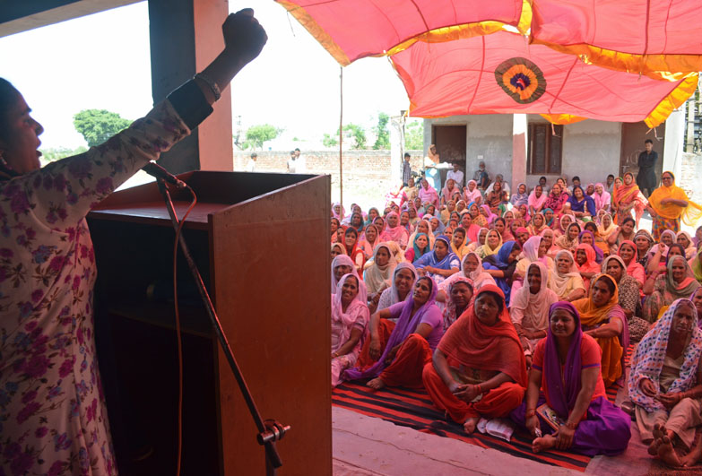 Women in community meeting, India