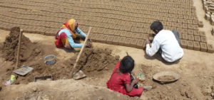 workers in indian brick kilns