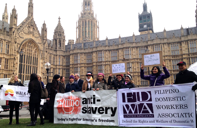 Photo: Protest outside of the Parliament demanding protections for overseas domestic workers