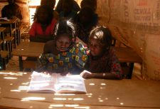 Girls reading a book in Niger school