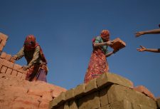 Family of bonded labourers in brick kiln, India