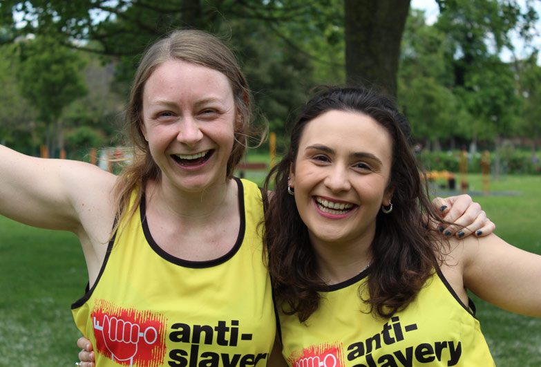 Two fundraisers in Anti-Slavery vests