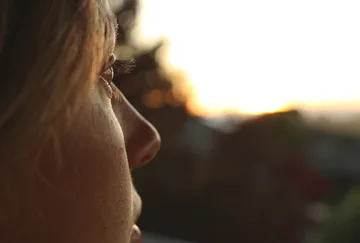 A person looks to the horizon