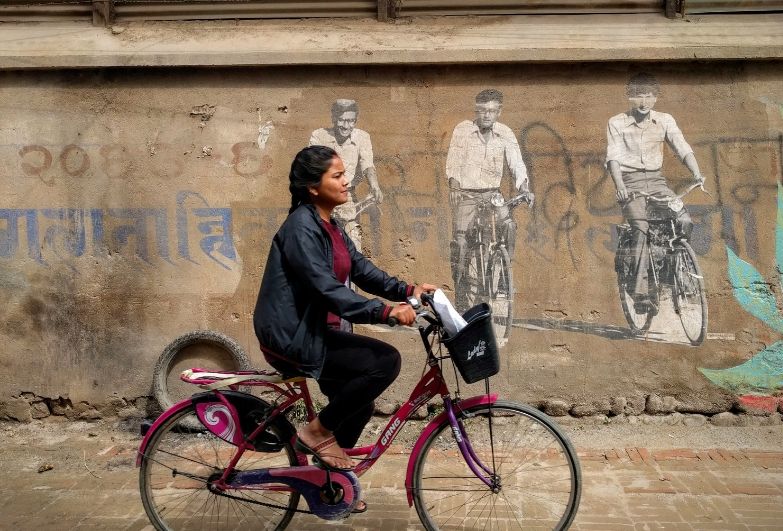 woman riding a bike