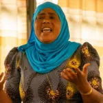 Sophia speaks at a workshop in 2022