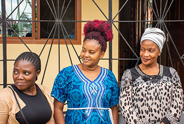 Women outside the TCDWC office.