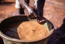 Sifting for gold in a mine in eastern DRC. Credit Olivia Acland.