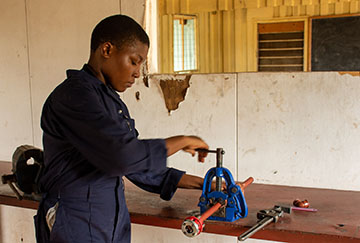 Zalika from Tanzania studying plumbing
