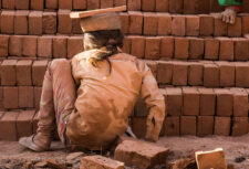 A child works in a brick kiln. Credit Bharat Patel.