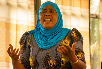Woman speaking during employer training workshop