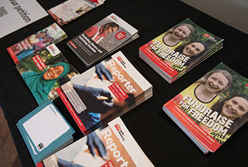 Copies of The Reporter magazine and other fundraising materials