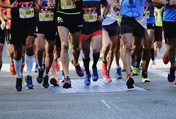 Marathon runners on a road