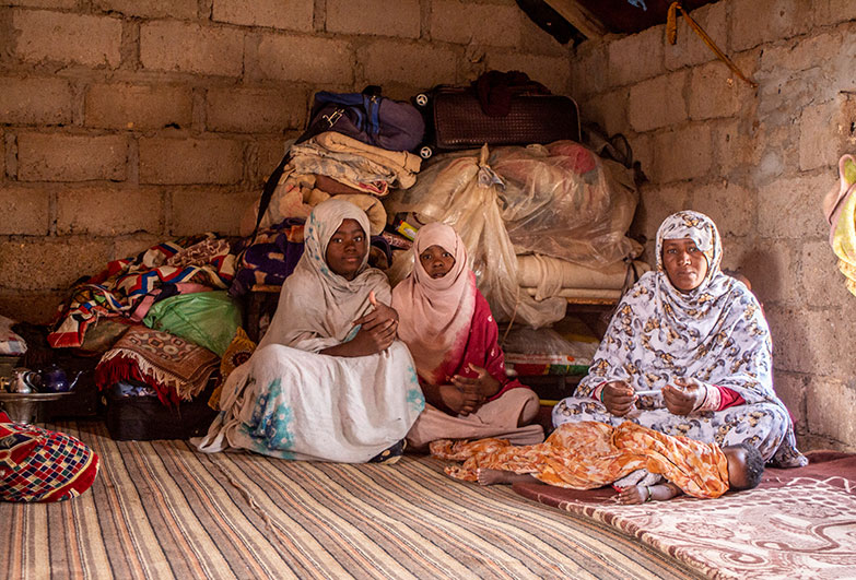 A mother and her children pictured in their home in Mauritania. Photo by Daouda Atar.