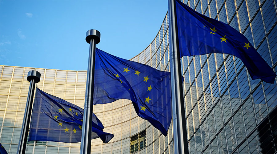 EU flags in front of European Commission in Brussels