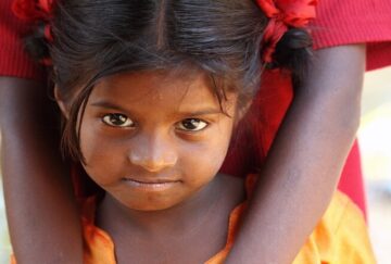 A girl looks at the camera